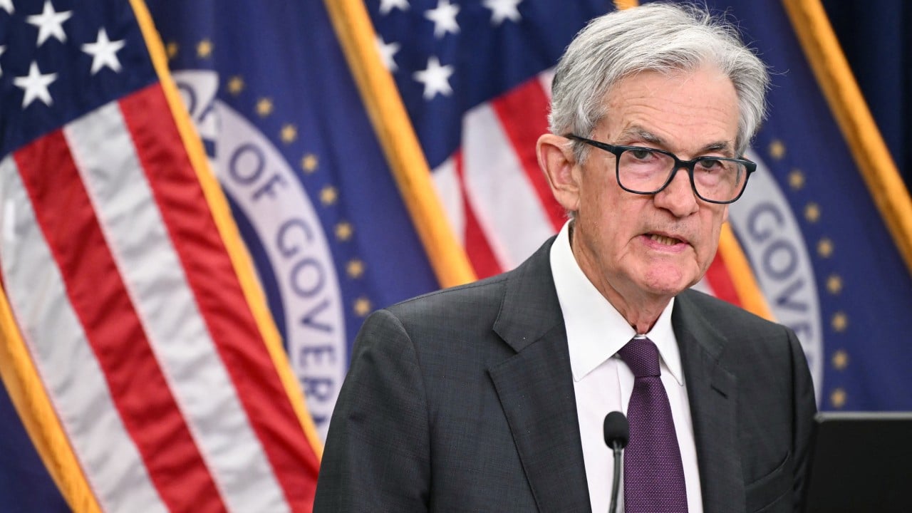 Hong Kong stocks waver as investors await rate-cut clarity