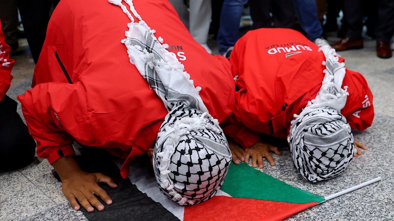 Toilet water, snatched hijabs: Malaysian activists recount Israeli detention