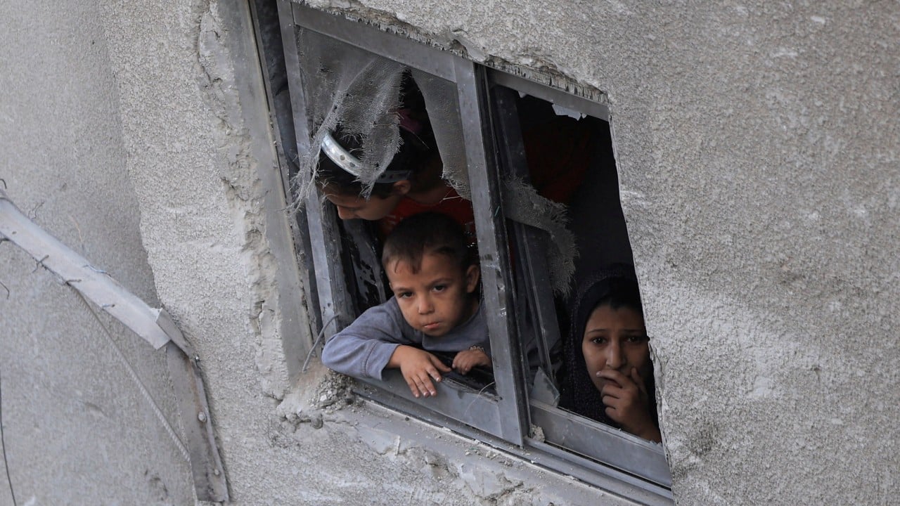 Israeli military says Gaza ceasefire back on after dozens killed in strikes