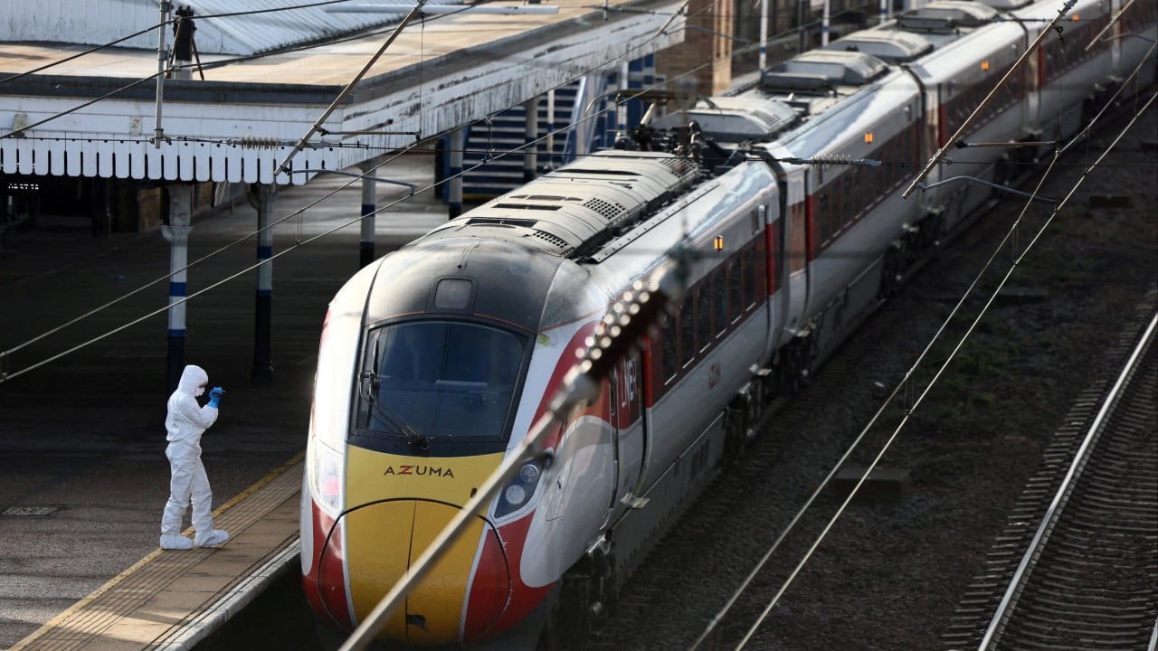 UK police release 1 of 2 men over train stabbing attack, laud ‘heroic’ worker