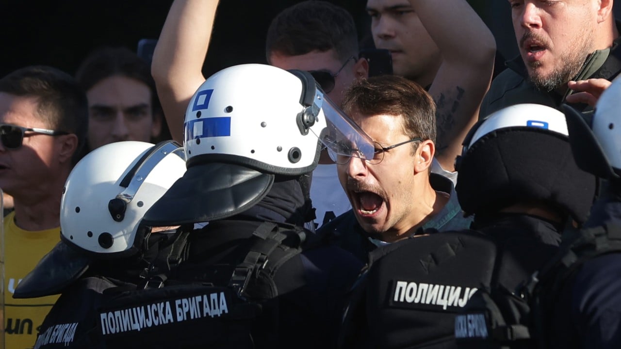 Serbia tensions boil as riot police separate president’s opponents and loyalists