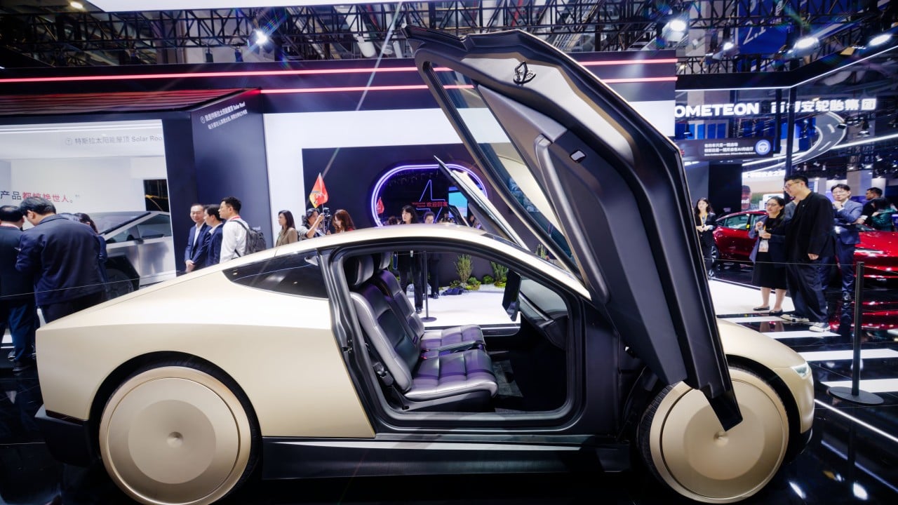 Tesla and global carmakers race against Chinese EV rivals at expo