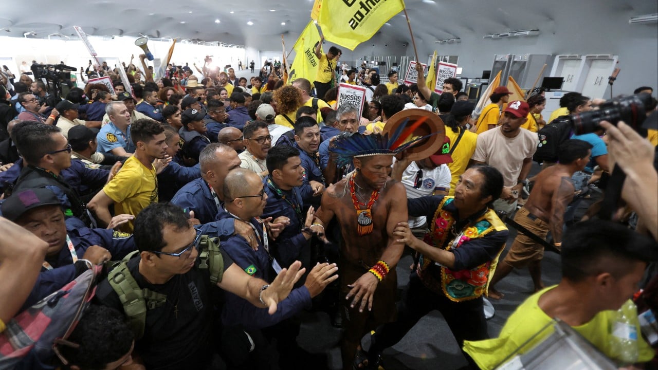 Protesters force way into UN climate summit venue, clash with security