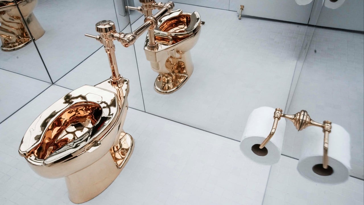 Solid gold toilet snapped up for US$12.1 million at New York auction