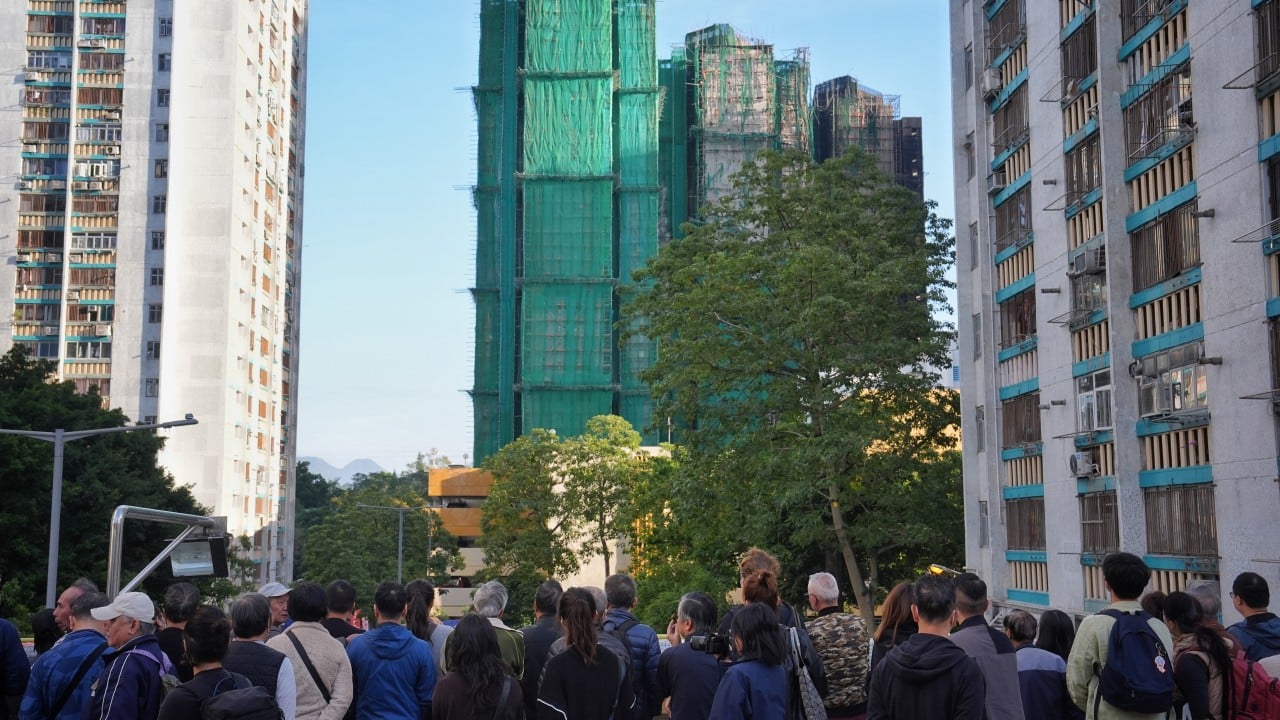Hong Kong scaffold nets come down after deadly fire as residents get more help