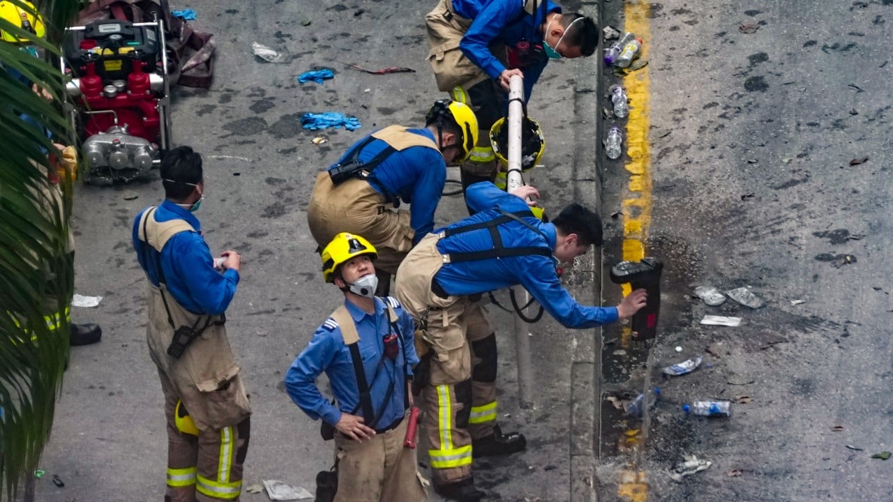 ‘Darkest corner’: firefighters haunted by Hong Kong blaze but vow to keep serving