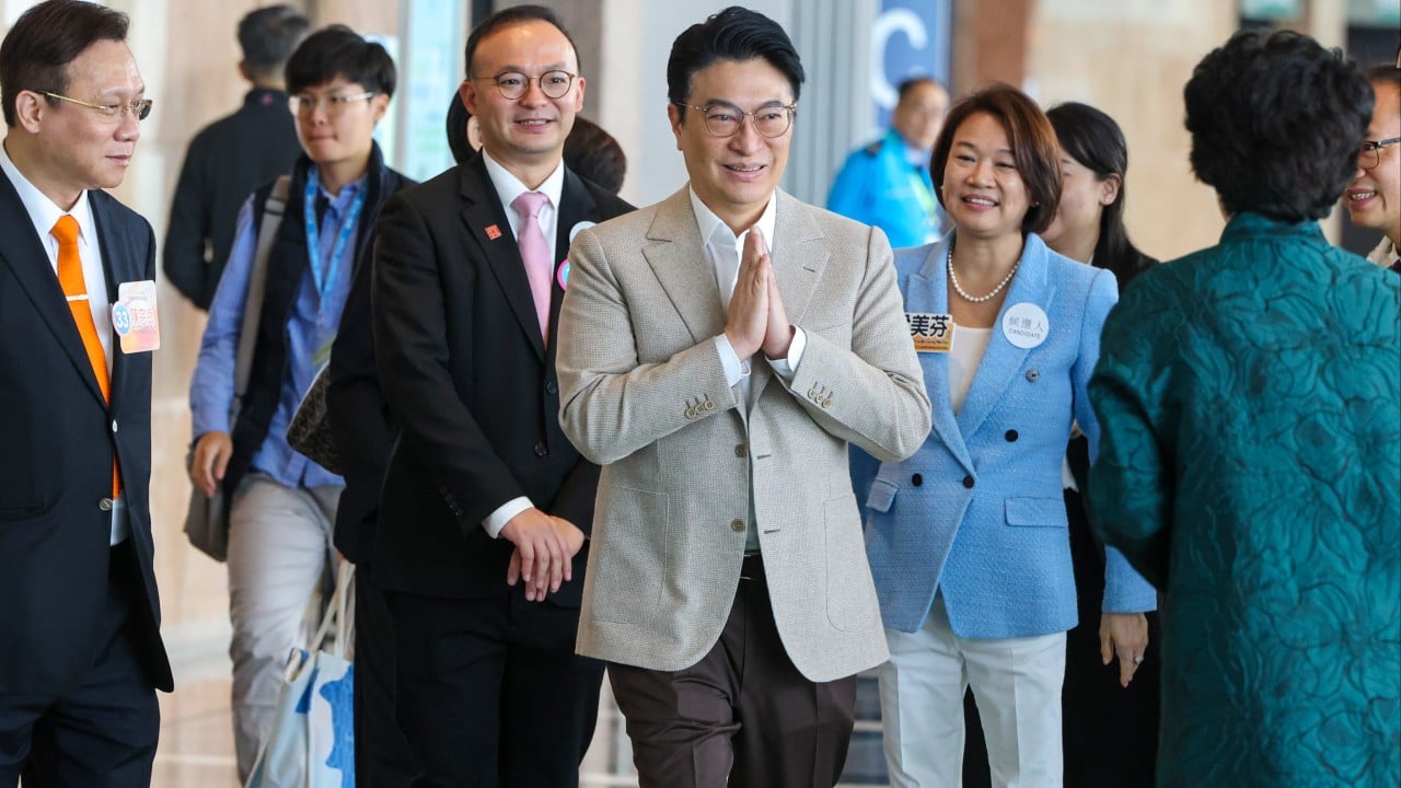 Hong Kong property tycoons turn heads at poll, urge voters to fulfil civic duty