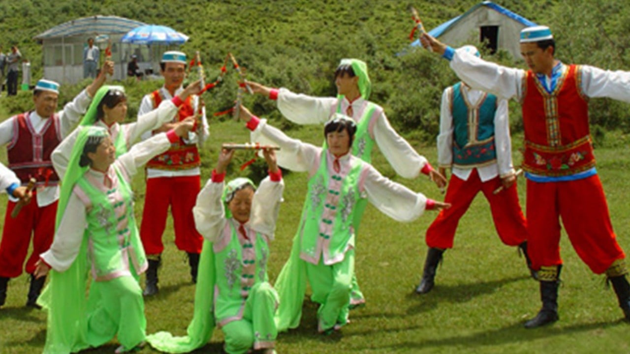 China Bao’an ethnic group’s ritual playfully whips bride’s dad for not disciplining daughter