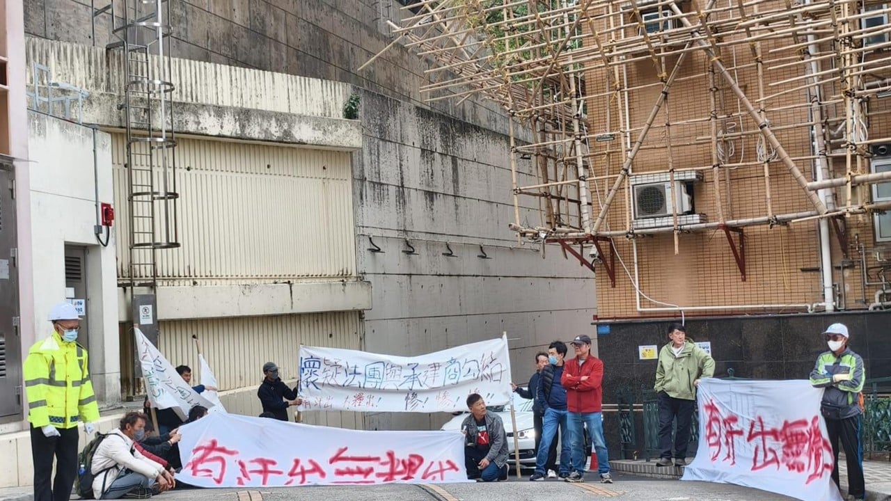 Workers stage protest to demand wages owed by contractor involved in Tai Po fire