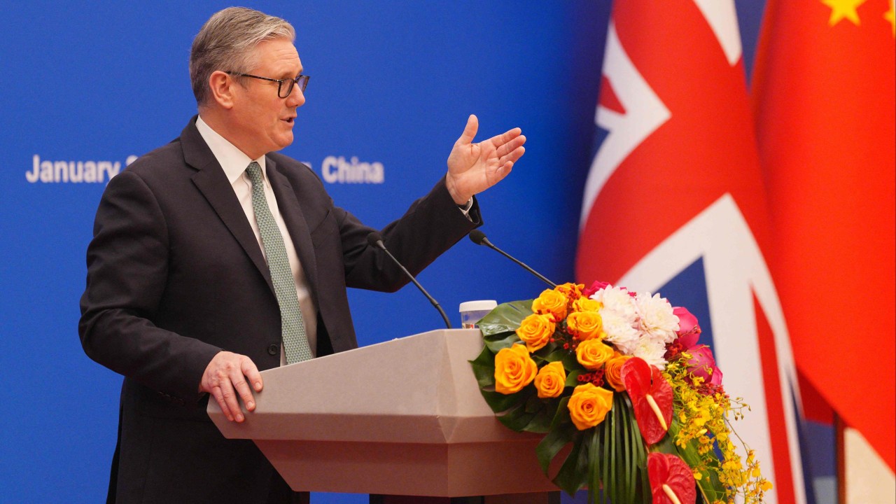 With China’s Xi, Britain’s Starmer hopes gift of Manchester United match ball scores points