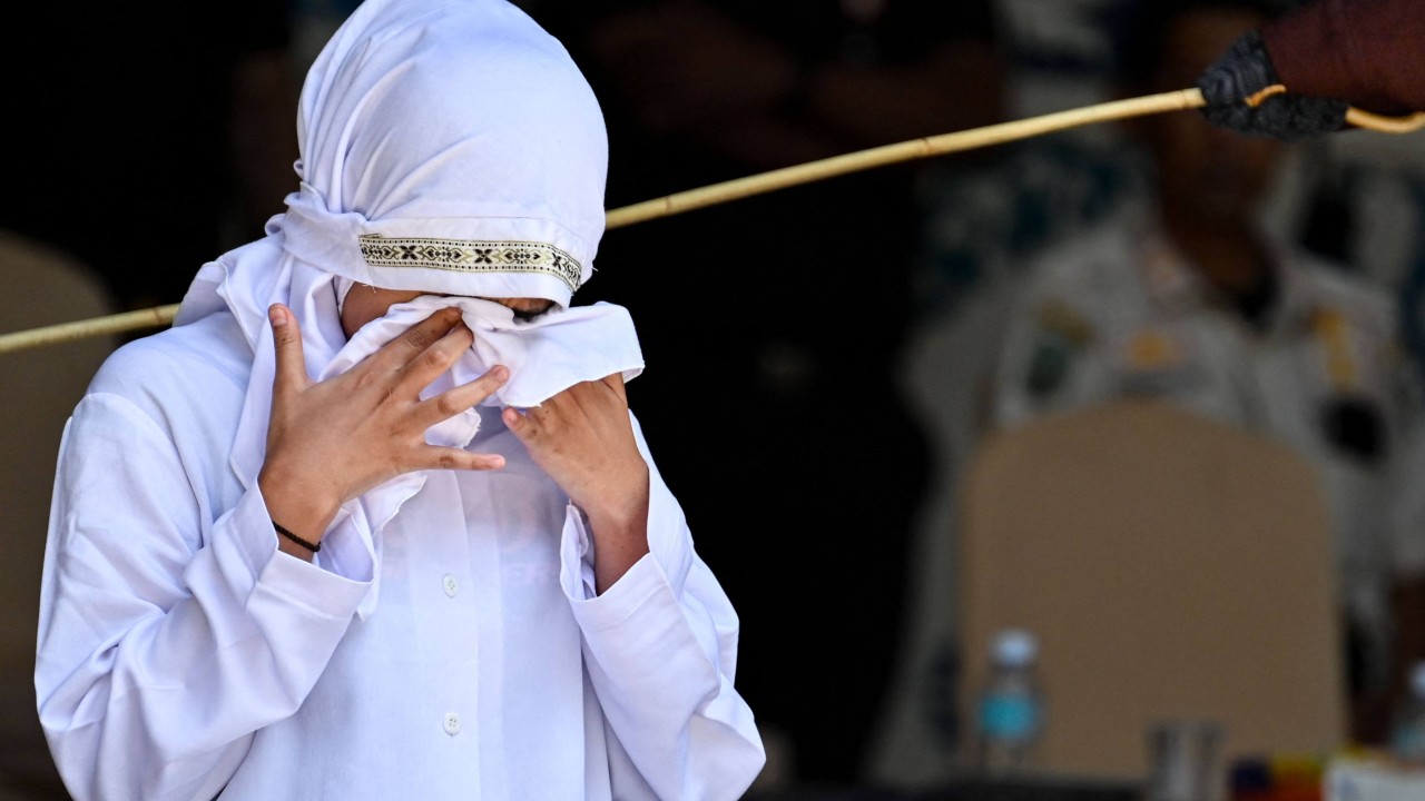 Indonesian woman collapses after 140 lashes for sex and alcohol