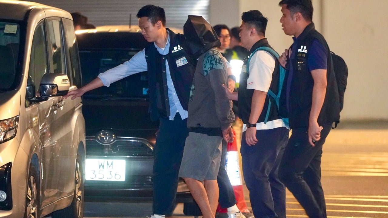 Fugitive caught after 37 years handed back to Hong Kong police