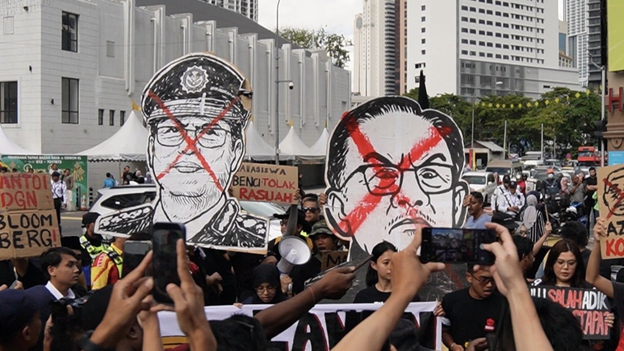 Hundreds of Malaysians rally to demand arrest of anti-corruption head: ‘enough is enough’