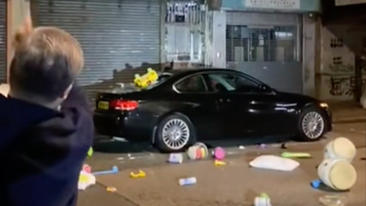 Mother in Hong Kong held after unattended son throws items from flat, damaging car