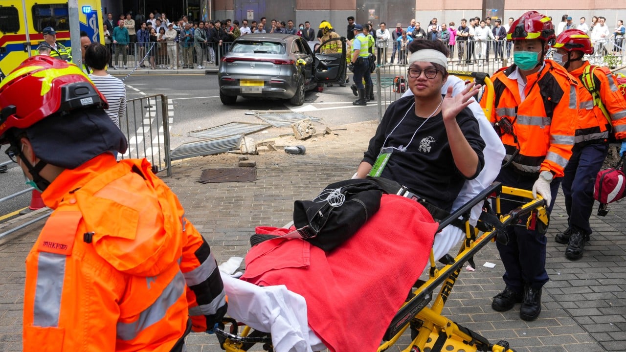 Elderly driver arrested after car mounts pavement in Hong Kong, injuring 9