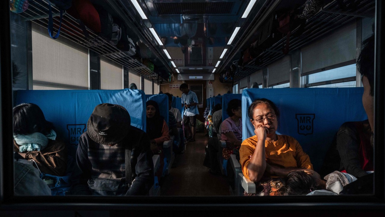 Myanmar travellers take to the trains as fuel prices rise