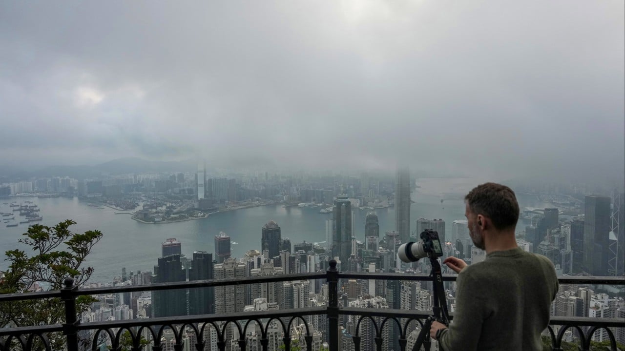 Observatory issues amber rainstorm warning as heavy rain falls over Hong Kong