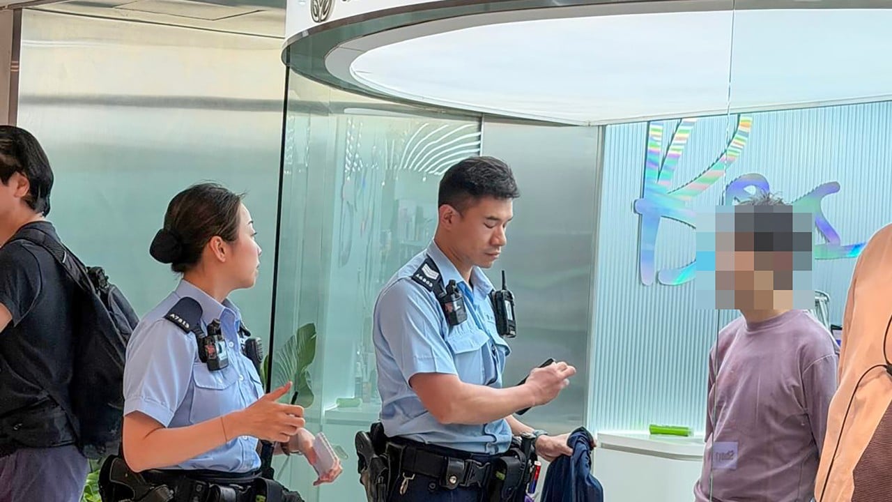 Hong Kong man arrested on suspicion of taking upskirt images of woman shopper
