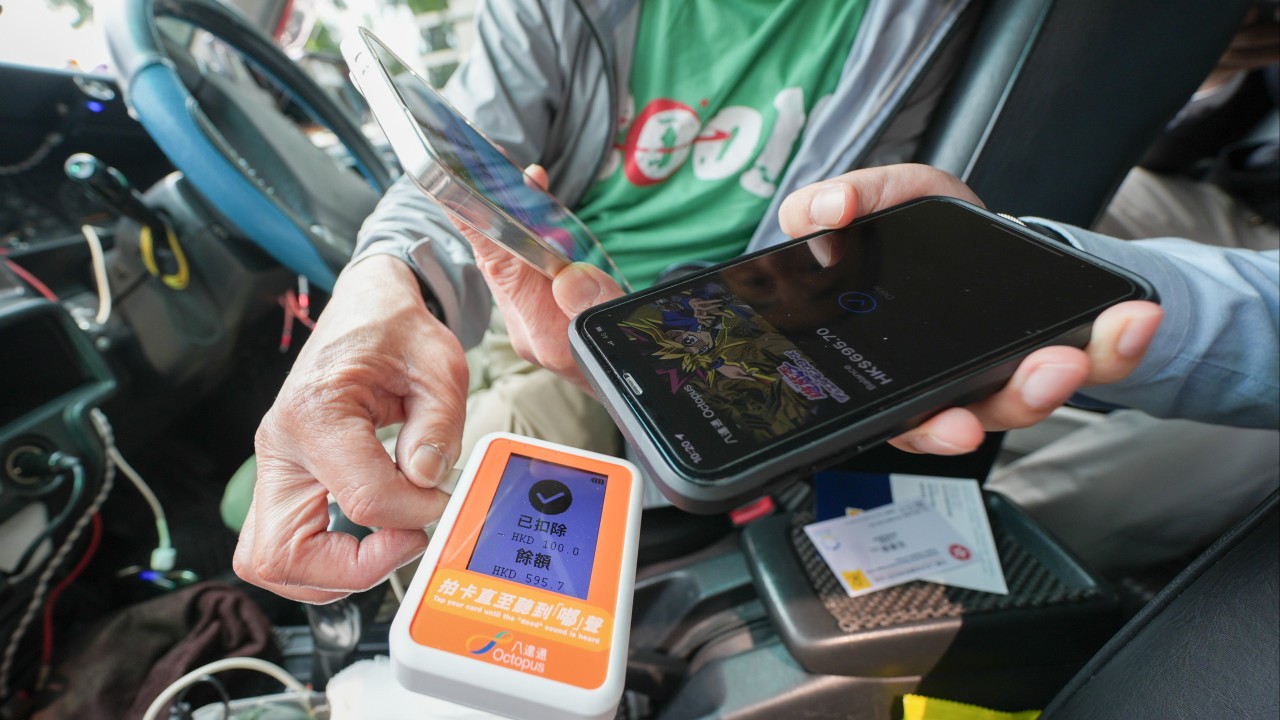 Some Hong Kong taxi drivers unprepared as new e-payments rule takes effect