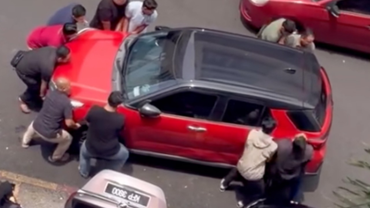 Malaysian woman’s apology for damaging double-parked car triggers outcry