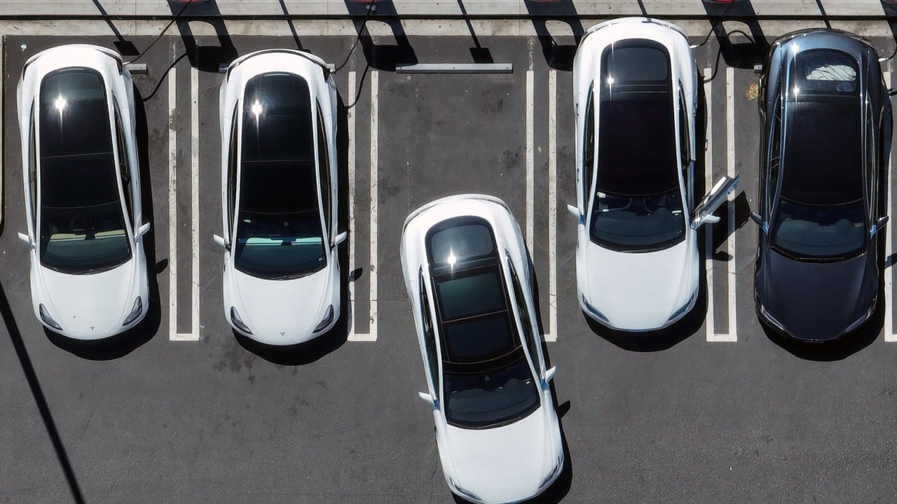 Tesla outraces China’s BYD in pure electric car sales to regain world’s top spot