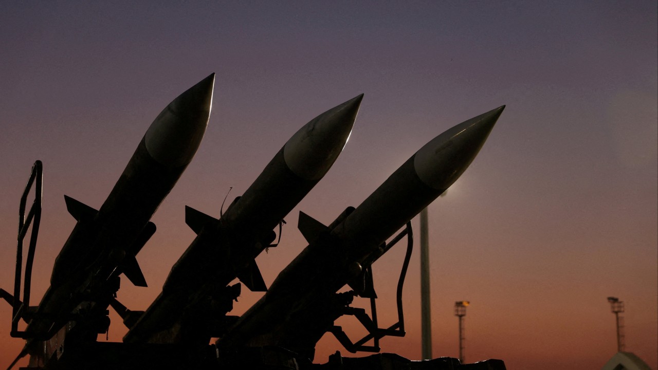 Trump warns of 50% tariffs on arms suppliers to Iran