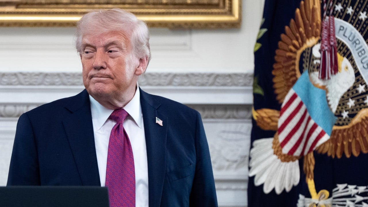 Trump reads from Bible after high-profile clash with pope