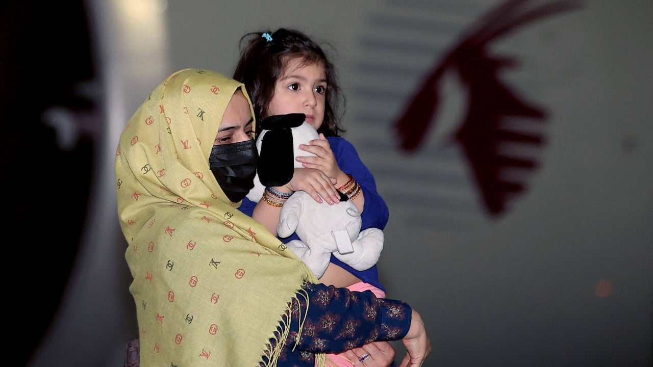 Taliban says Afghans stuck in Qatar who helped US in war can safely return home