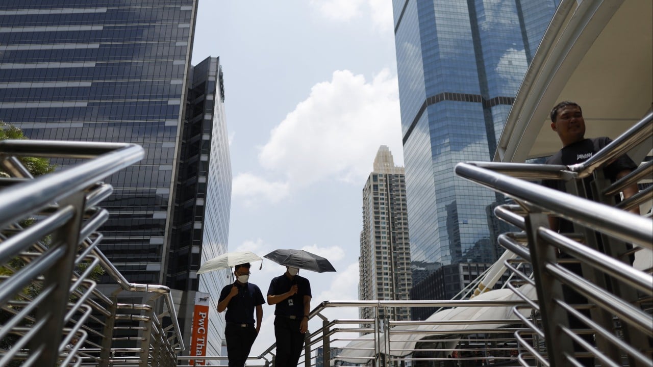 Southeast Asia’s office workers reel from energy-saving drive, heatwave