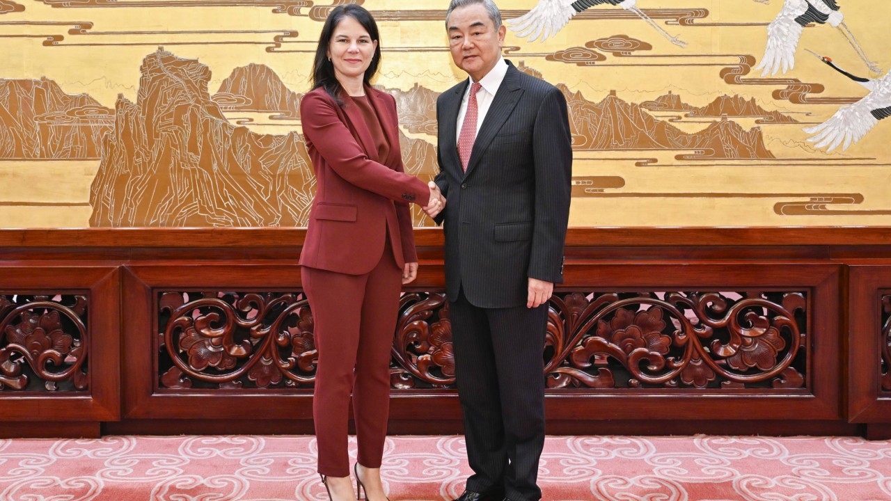 ‘Might over right’ imperils international justice, Wang Yi tells UN’s Baerbock