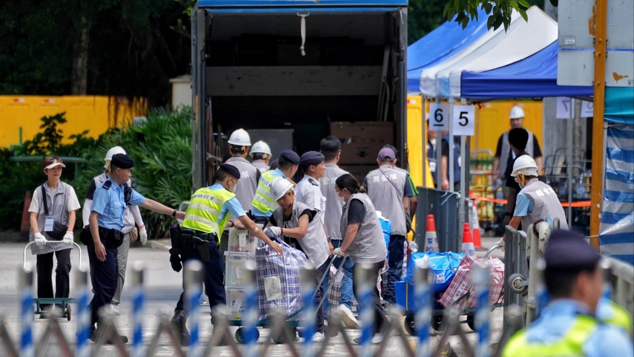 ‘Heavy’ hearts as residents of Wang Fuk Court’s only spared block return again