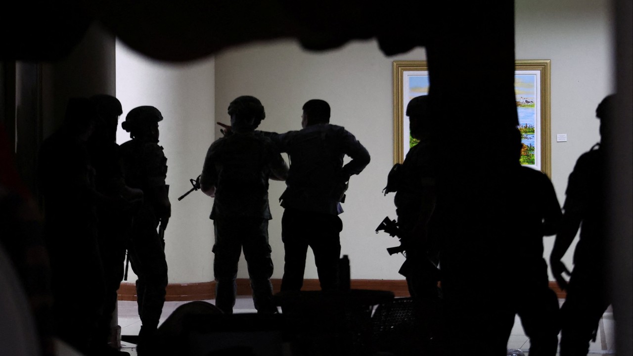 Gunshots fired in stand-off at Philippine Senate over ICC suspect