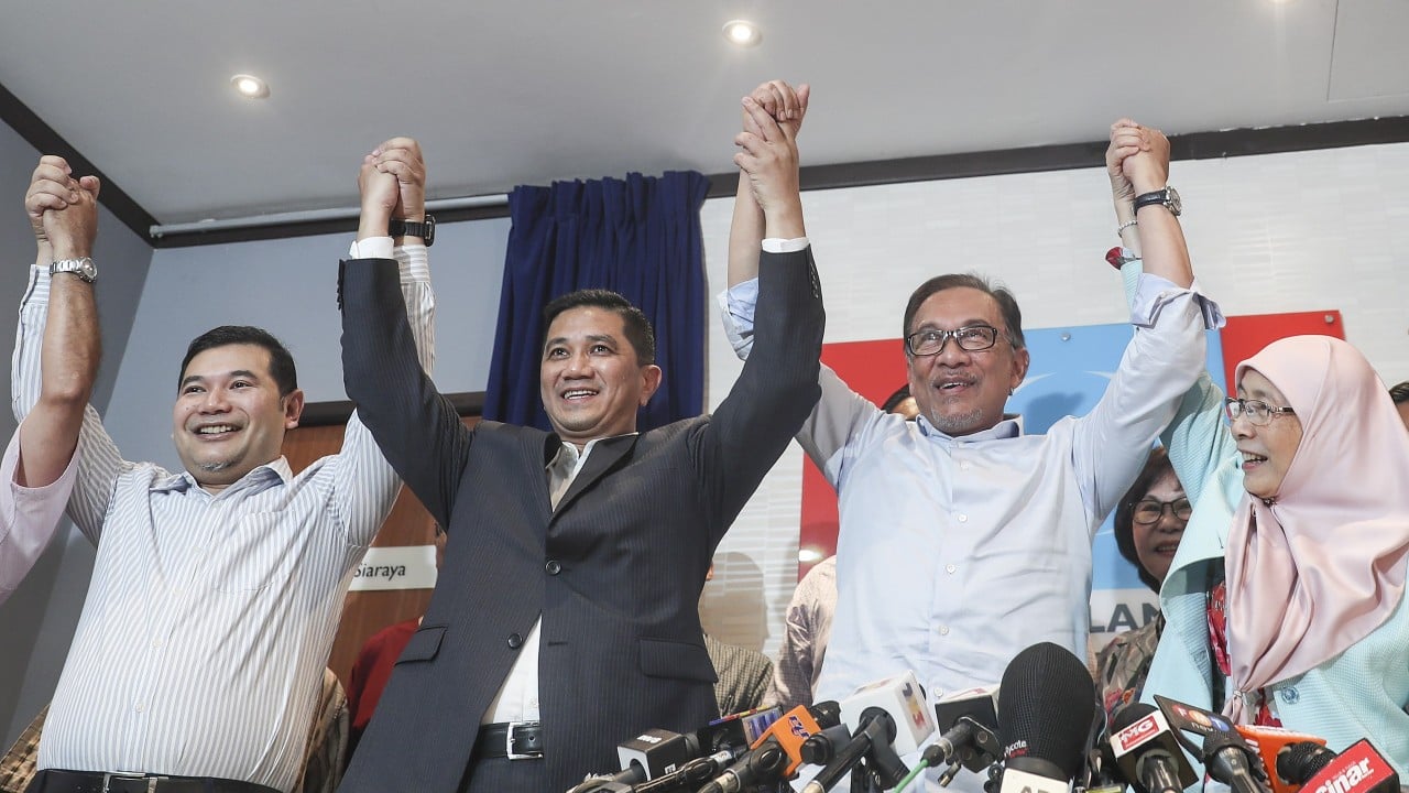 Malaysian ex-ministers resign from Anwar’s party, snap election rumoured