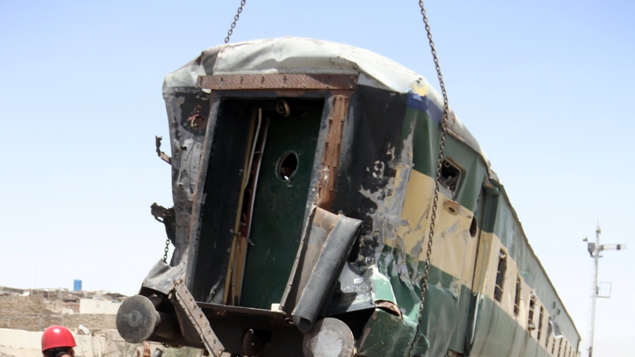 Pakistan attack kills at least 24 as explosive-laden car hits train carriage