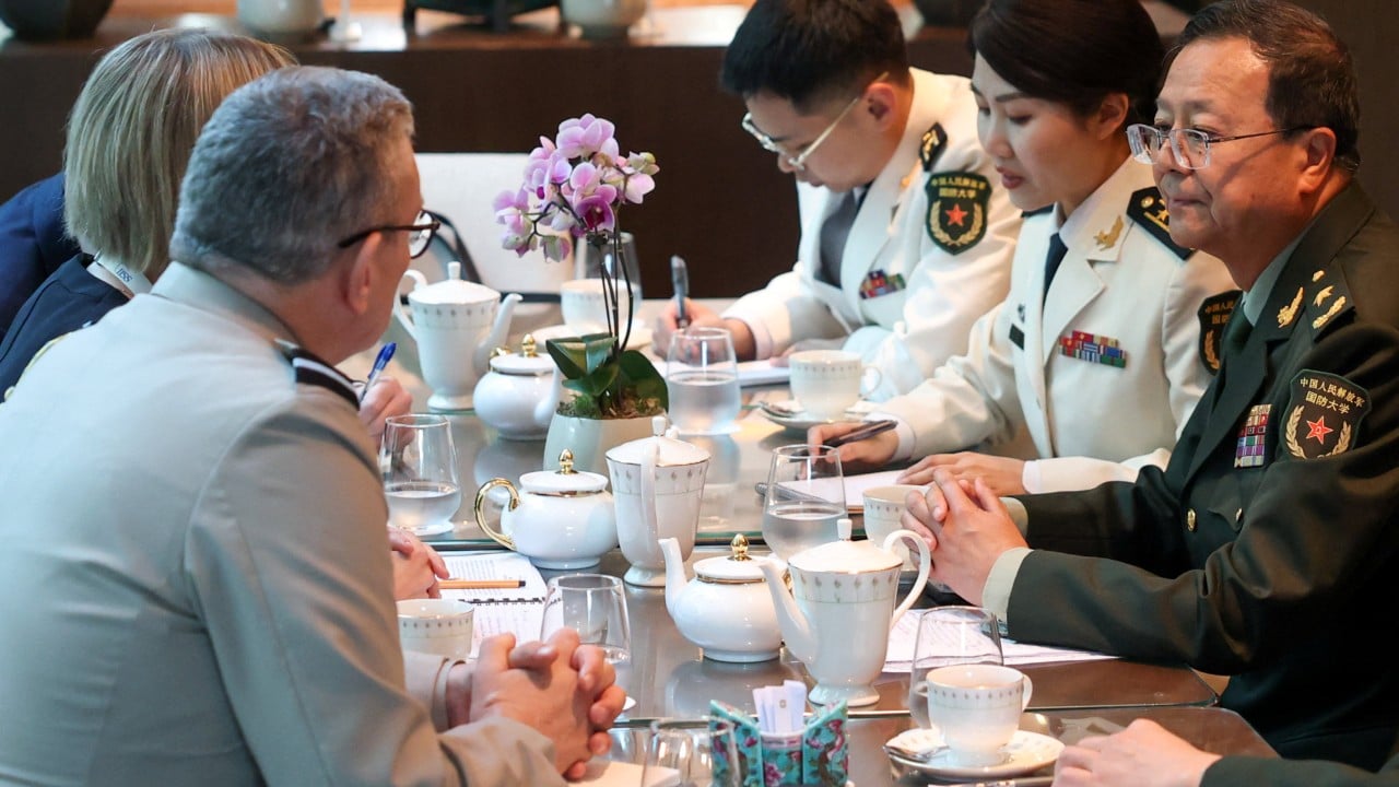 Chinese and UK officials at Shangri-La Dialogue vow to strengthen military ties