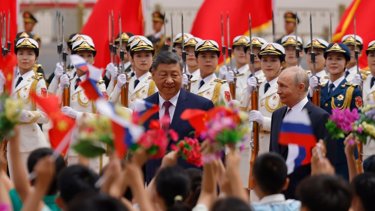 EU toughens China trade policy; Putin visits Beijing