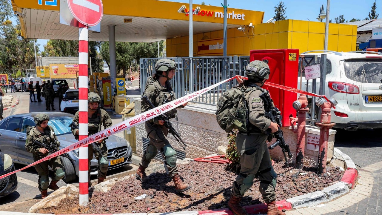 Arab attacker opens fire in central Israel, killing 1 and wo