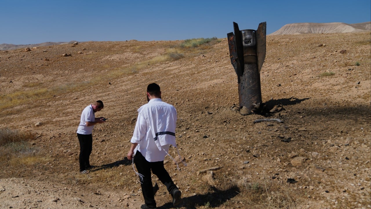 Israel, Iran appear to pause strikes after trading fire for first time since ceasefire