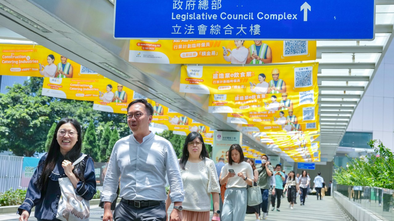 Hong Kong leader defends tougher civil service app