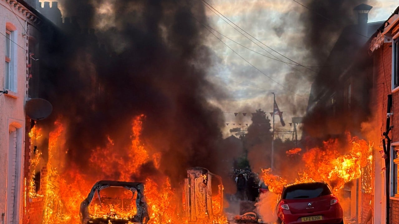 Anti-immigration protesters torch buildings and vehicles, block roads over Belfast stabbing