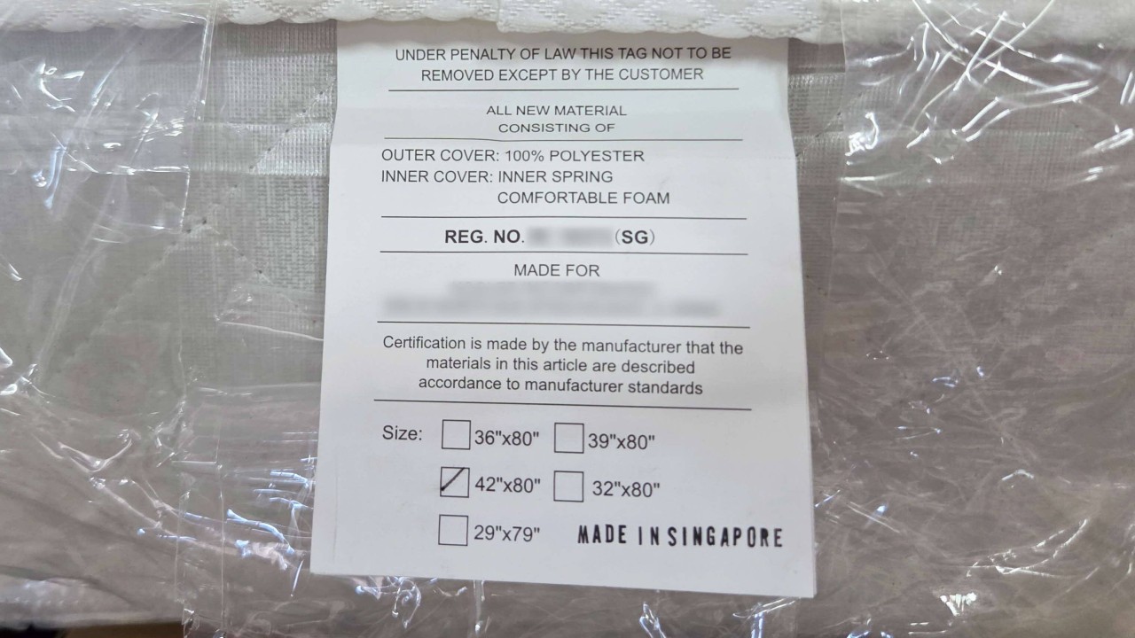 Singapore charges 3 men over US$18 million fake country of o
