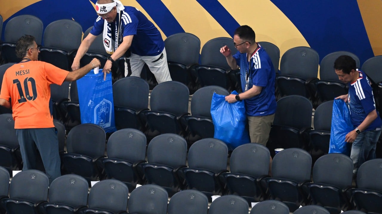 ‘It’s our way’: Japan fans win hearts by cleaning up after World Cup match
