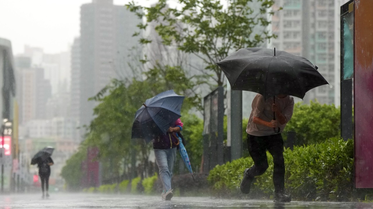 Hong Kong lowers black rainstorm warning to amber after disruptions, flooding