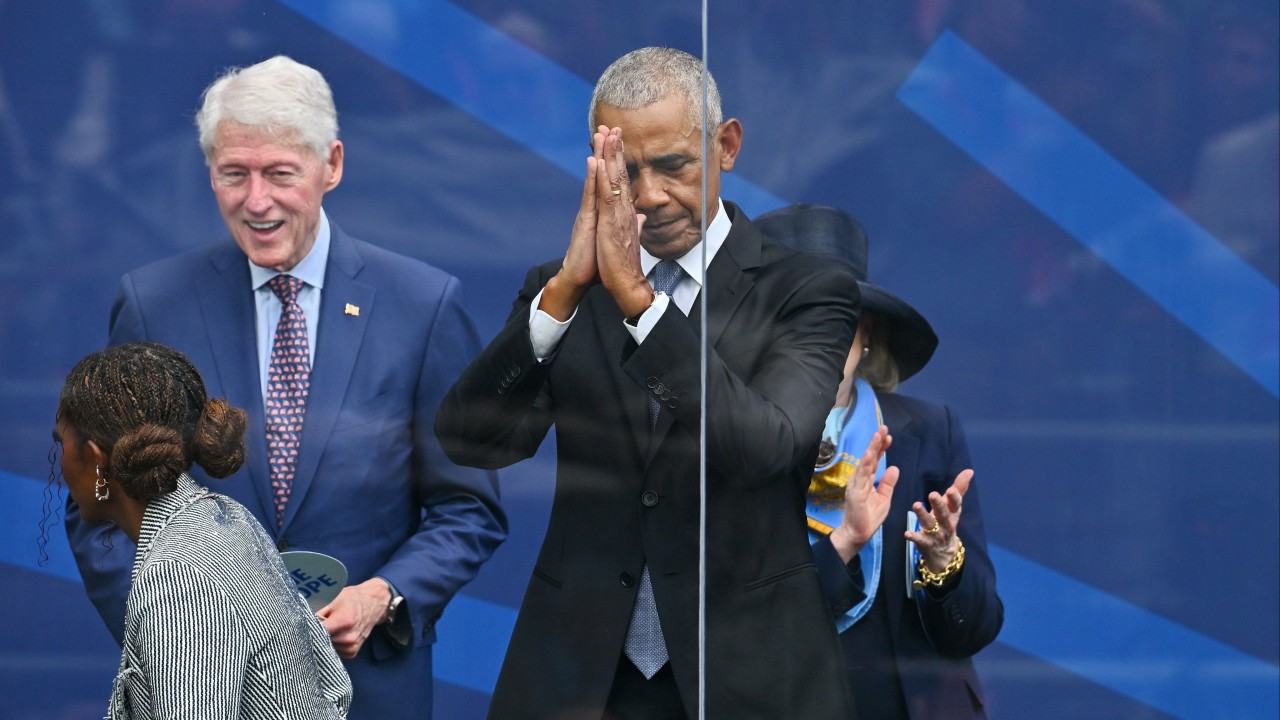 Ex-presidents and stars, but no Trump, turn out for Obama library