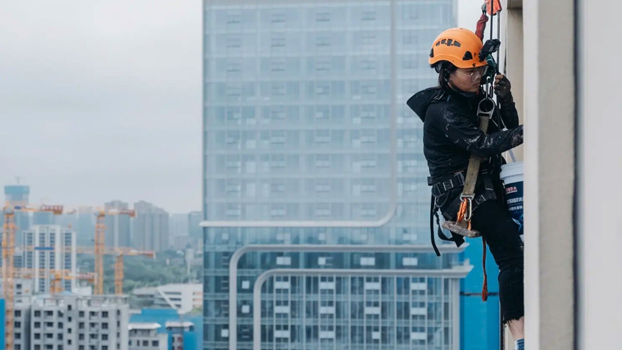China ‘Spider-Woman’ single mum cleans, repairs high-rises to support disabled son, ailing mother