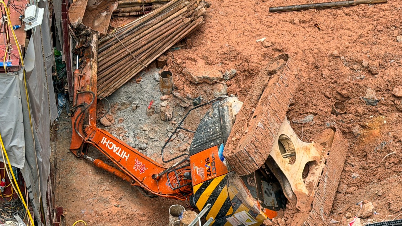 Worker killed, another unconscious after excavator tips over in Hong Kong