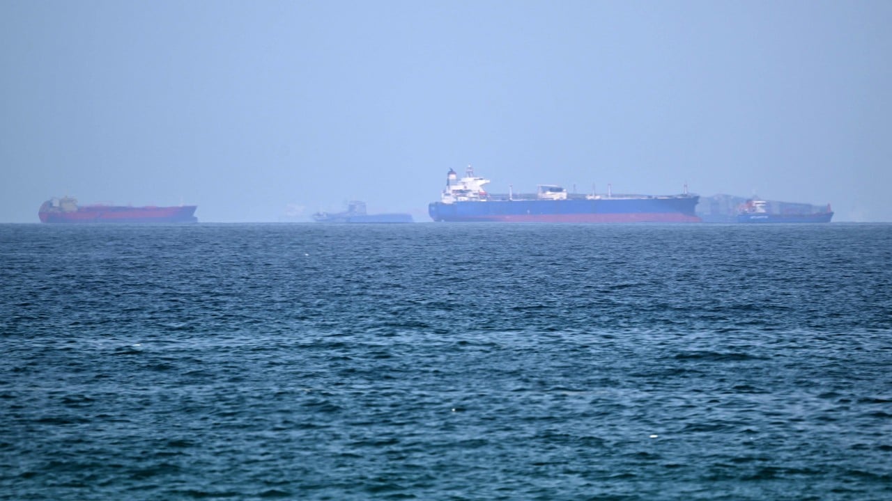 Iran warns ships not to bypass its chosen Hormuz route as interim deal tested