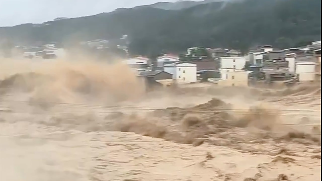 China dam collapse: hundreds evacuated after typhoon rains breach Guangxi reservoir