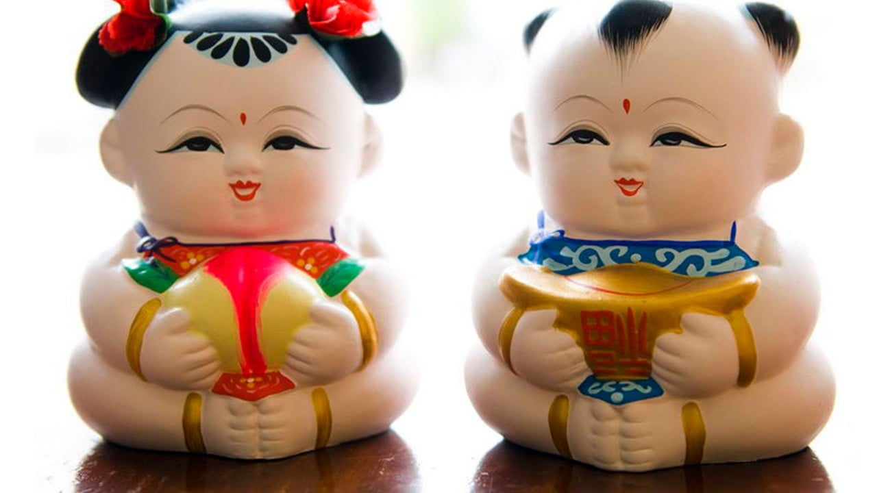 What are the hidden Buddhist symbols in Chinese Da A Fu figurines