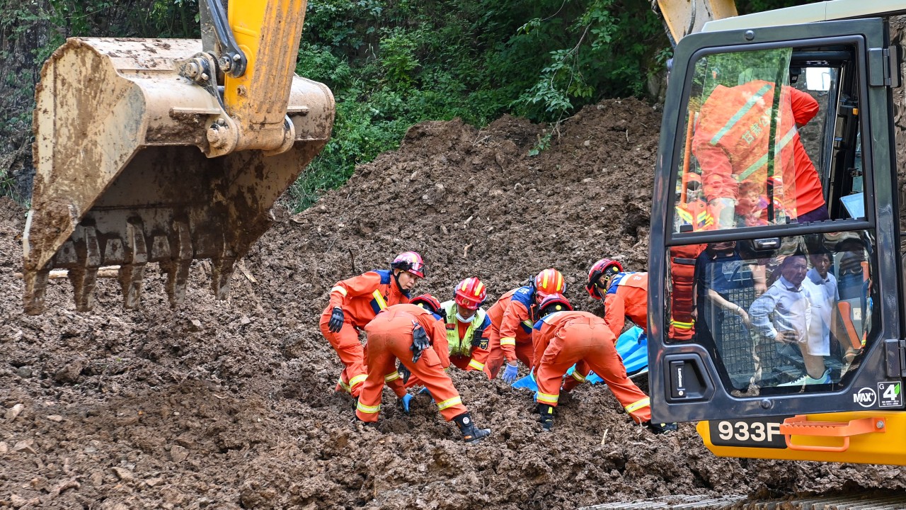 Woodworkers buried as landslide death toll rises to 21 in weather-ravaged China